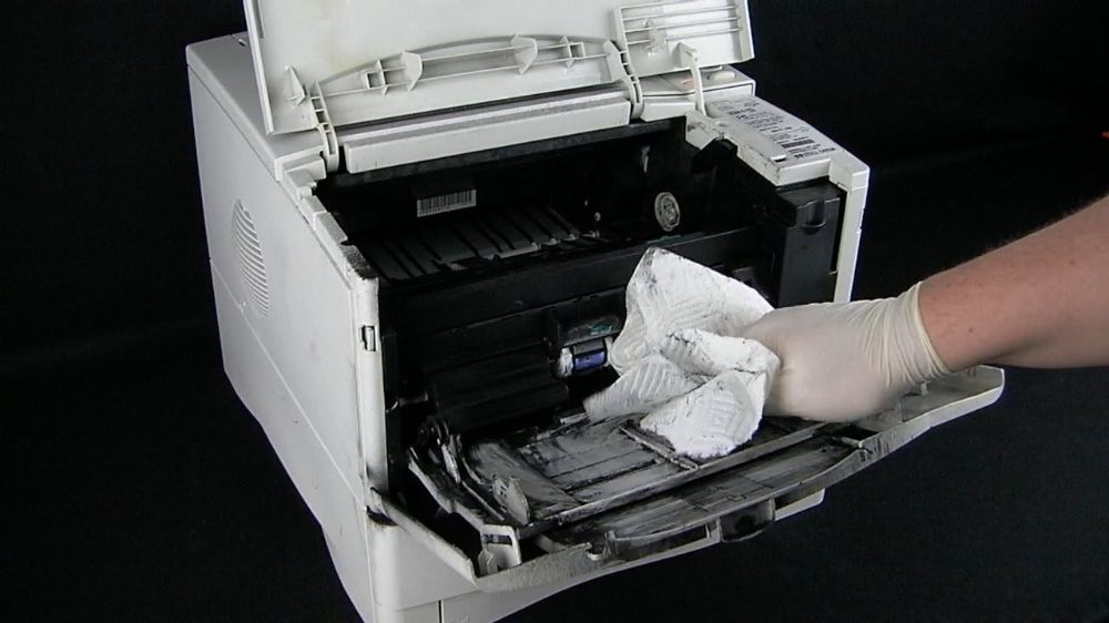 Как очистить принтер от тонера